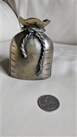 Metal in brass finish money sock shaped display