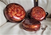 Handcrafted vintage large round wood nesting boxes with abstract metallic lacquer design