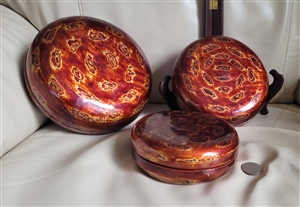 Handcrafted vintage large round wood nesting boxes with abstract metallic lacquer design