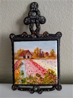 Vintage trivet with hand painted tile