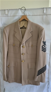 A rare and complete vintage Vietnam era US Navy petty officer first class khaki uniform set with trousers