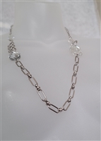 Elegant necklace in silver tone metal with beads