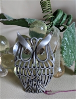 Silver tone metal cut out design OWL pendant