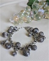 Bohemian antique silver tone chic charm bracelet