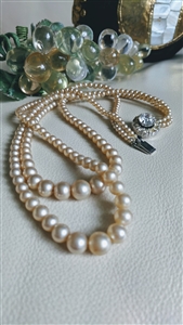 Faux pink hue pearls waterfall necklace pave clasp