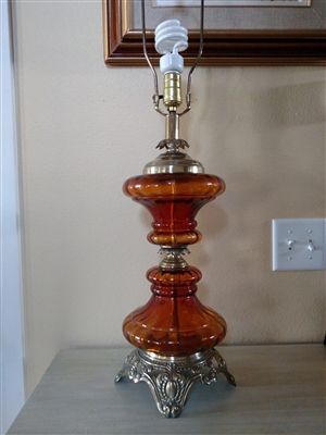 Amber glass post and gold tone metal table lamp