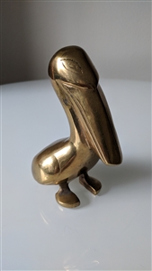 Brass standing gold tone pelican sculpture