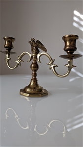 Two candle holder in brass finish and Eagle topper