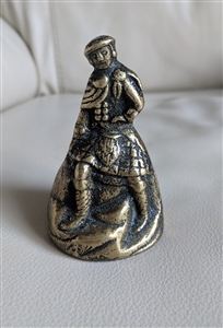 Forged metal bell with Renaissance men figure