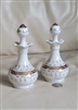 White porcelain gold accent vanity perfume bottles