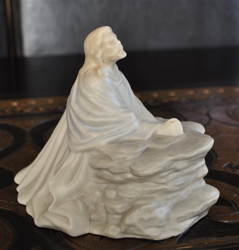 Praying man porcelain mold in pastel colors