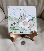 Ceramic tile trivet with Betsy in the pasture