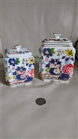 Soft porcelain set of two jars with floral decor