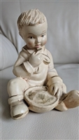 Coventry chalkware sitting boy figurine 1940