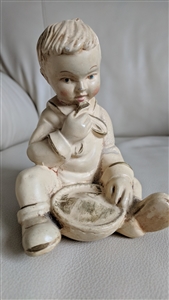 Coventry chalkware sitting boy figurine 1940