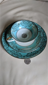 Gold floral over blue background Bavarian teacup