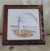Vitromex tile with painted lighthouse scenery
