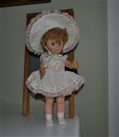 Hard plastic doll with rubber head marked U