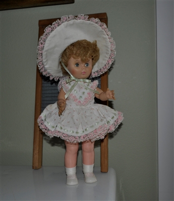 Hard plastic doll with rubber head marked U