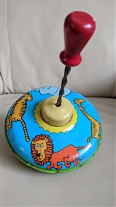 Metal spinning top with wild animals painted decor