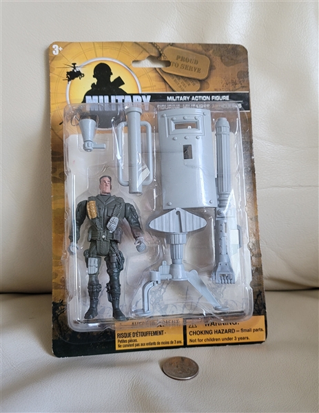 Greenbrier International Inc Military posable action figure with gear.