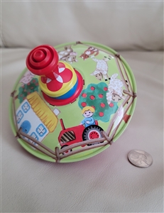 Spinning top farmhouse theme child metal toy