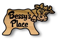 These Custom  Wood Family Signs look like a Cow