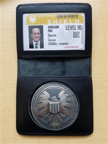 Shield Agent Metal Badge and holder.