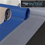 Rolls of tan, blue, and gray VinAir wet area floor mats