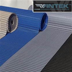 Rolls of tan, blue, and gray VinAir wet area floor mats