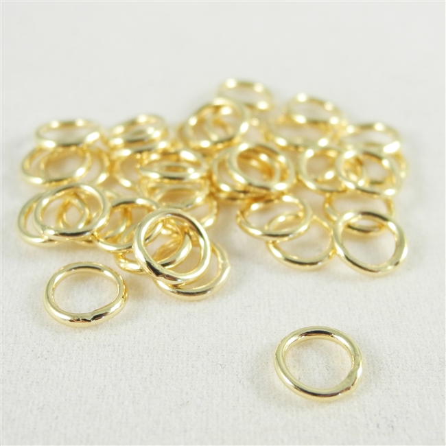 6mm soldered Jump Rings. Gold Plate. There are 25 pieces in a package.