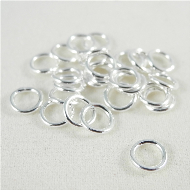 6mm soldered Jump Rings. Silver Plate. There are 25 pieces in a package.