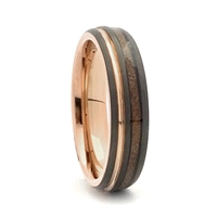 STEEL REVOLTâ„¢ Nobility II is a Tennesses Whiskey Ring. It is a comfort fit domed tungsten carbide wedding ring with rose gold color accents and wood cut from the whiskey barrels once used by the Jack Daniel's Distillery