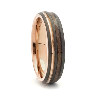 STEEL REVOLTâ„¢ Nobility II is a Tennesses Whiskey Ring. It is a comfort fit domed tungsten carbide wedding ring with rose gold color accents and wood cut from the whiskey barrels once used by the Jack Daniel's Distillery