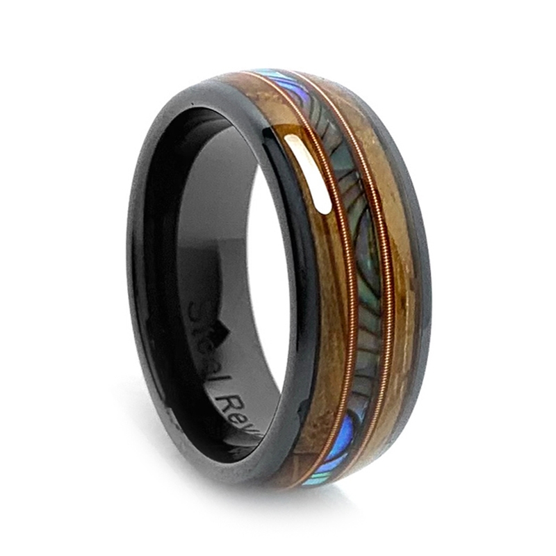 BLACK JACK is a Tennessee Whiskey Ring created by STEEL REVOLT™. It is an  8mm comfort fit black high-tech ceramic wedding ring with abalone shell,  guitar strings, and wood cut from the