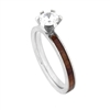 STEEL REVOLTâ„¢ Whiskey - I Promise is a Tennessee Whiskey Engagement Ring. It is a 3 mm comfort fit domed titanium engagement ring with CZ and wood cut from the whiskey barrels once used by the Jack Daniel's Distillery