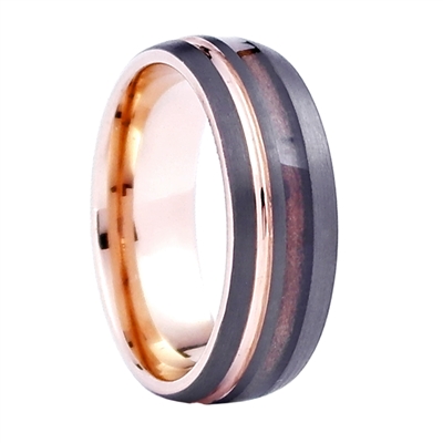 STEEL REVOLTâ„¢ Nobility is a Tennessee Whiskey Ring. It is a comfort fit domed tungsten carbide wedding ring with rose gold color accents and wood cut from the whiskey barrels once used by the Jack Daniel's Distillery