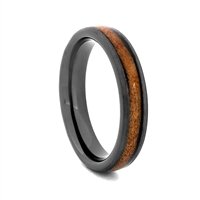 STEEL REVOLTâ„¢ Charred Whiskey II is a Tennessee Whiskey Band. It is a 4 mm comfort fit black high-tech ceramic wedding ring with wood cut from the whiskey barrels once used by the Jack Daniel's Distillery