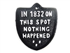 Cast iron sign, 'IN 1832 ON THIS SPOT NOTHING HAPPENED'