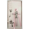 Baptism crib cross and rosary