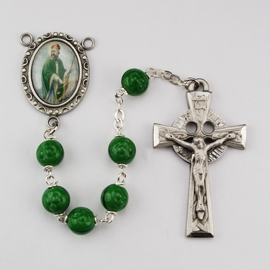 Saint Patrick rosary has green wood beads and an image of St. Patrick for a rosary center and a pewter crucifix. Gift boxed