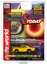 AUTO WORLD 69YELLOW... XTRAC 1969 CHEVROLET CAMARO - YELLOW HO SLOT CAR