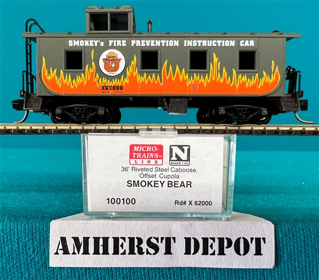 100100 Micro Trains Smokey Bear Steel Caboose