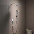 brushed nickel wall mounted round shower with handshower and dual controller
