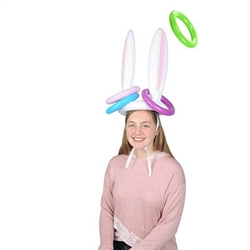 The Inflatable Bunny Ears Ring Toss is made of plastic and includes (1) bunny ears hat with tie chin straps - 16 inches tall, and (4) assorted rings - 7 1/4 inches. No returns. Do not over inflate.