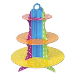 Arrange the scrumptious cupcakes on this fun and colorful Dots & Stripes Cupcake Stand. This colorful stand features fun shades of red, blue, green, purple, orange and white, not to mention dots, stripes and lines. Stands 13.5 inches tall. One per pack.