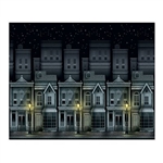 Use the Victorian Townscape Backdrop to re-create an 1800's nighttime city street scene. Street lamps cast shadows upon a row of tall city homes. Measuring 4 feet high and 30 feet long, this flexible plastic backdrop can be easily cut to the needed size.