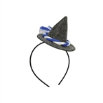 The Oktoberfest Peasant Hat Headband is a cute little accessory to add to your Oktoberfest outfit. Attached to a black plastic headband sits a grey fabric peasant hat, adorned with a little blue and white rope accent.  One size fits most. No returns.