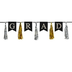 The Grad Tassel Streamer measures 13 inches tall and 6 1/2 feet long. Grad is printed in silver letters on black cardstock with alternating gold and silver tassels. Contains one streamer per package.