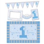 1st Birthday High Chair Decorating Kit - Blue features a chair mat, photo frame, crown, pennant streamer, and sign. Items are a combination of printed card stock, plastic, and felt. These photo props help commemorate the big event!